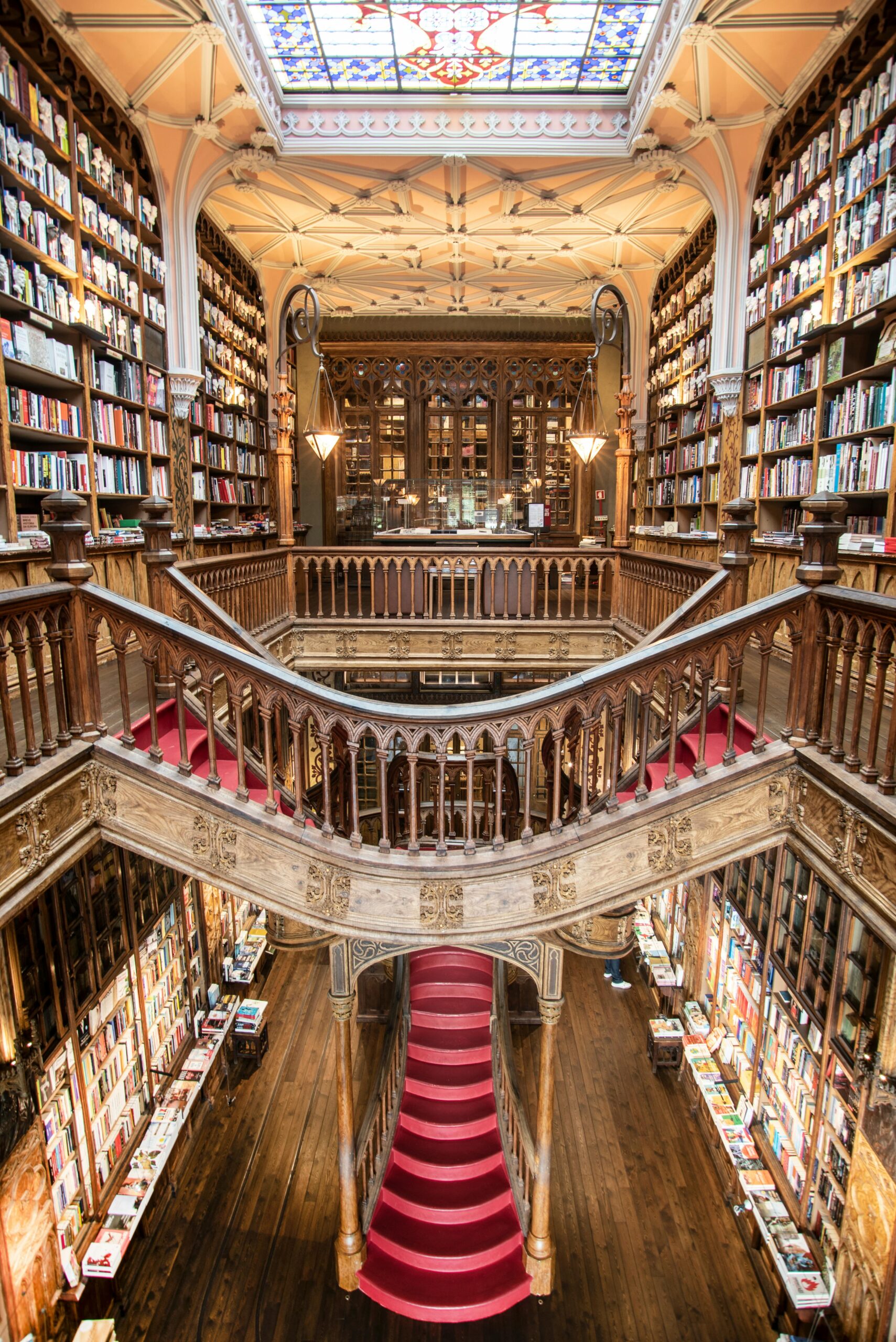 Stunning view of the iconic Livraria Lello's grand staircase and bookshelves in Porto, Portugal.